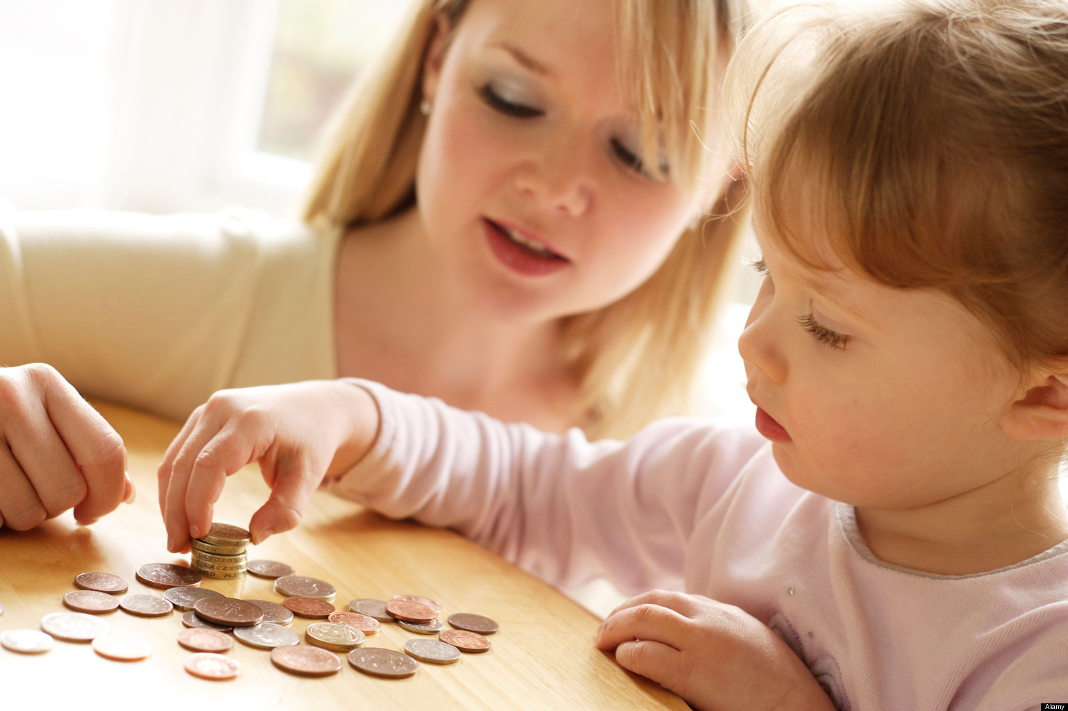 Mother and daughter counting money